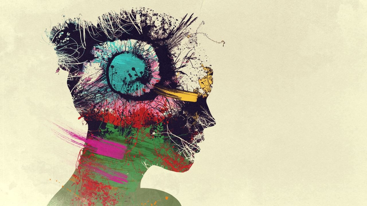 Head silhouette with colourful abstract elements