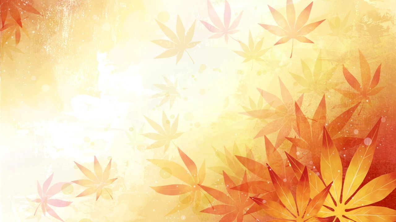 Autumn maple leaves on a golden background