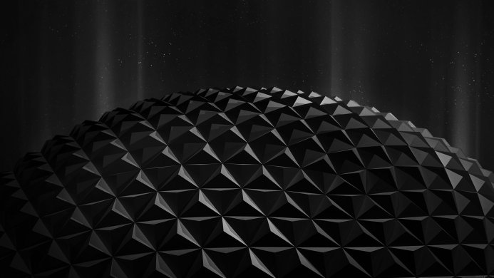 A black geodesic dome with triangular panels against a starry background