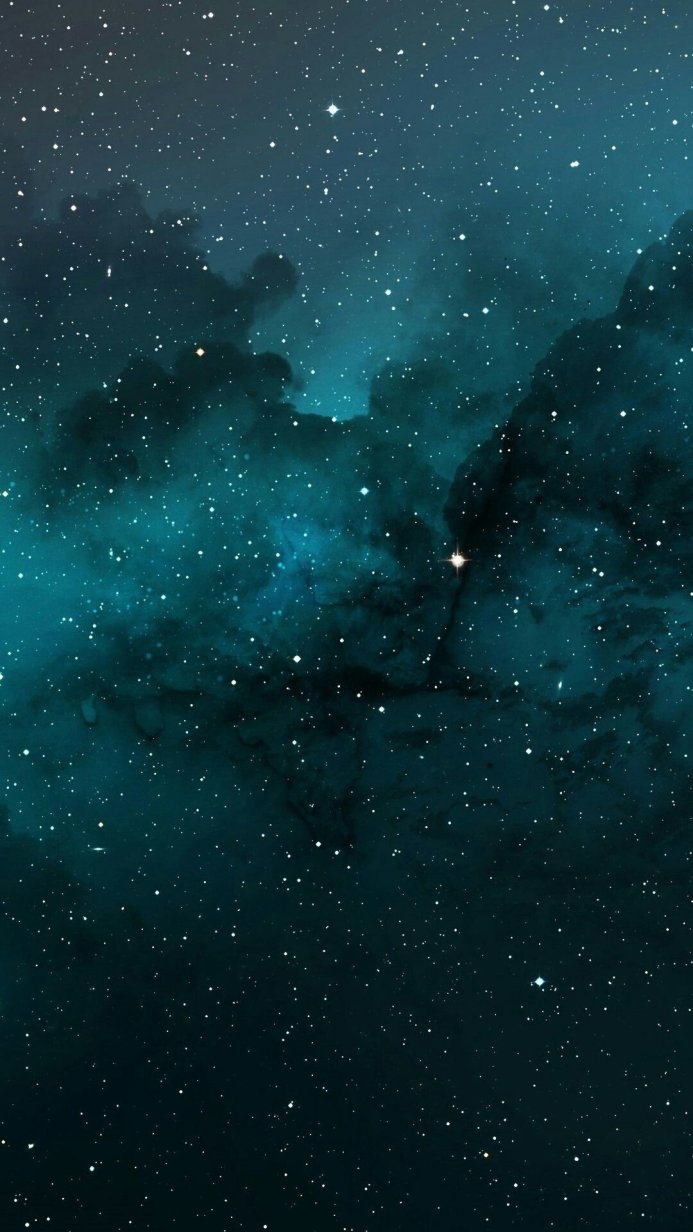 A nebula with stars in the dark blue sky