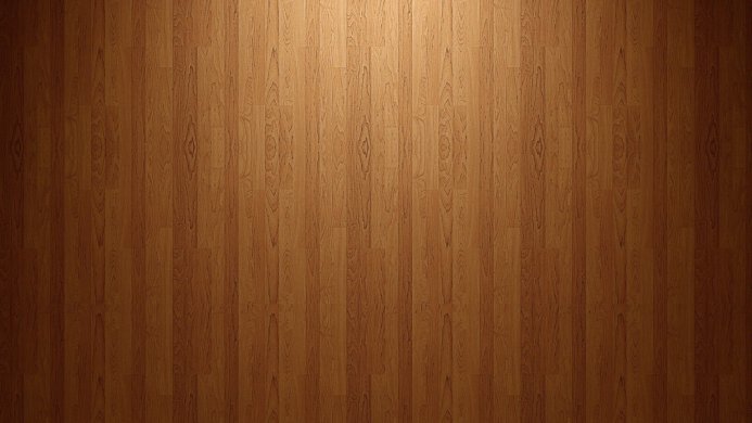 A close-up of a brown wooden floor showing the wood grain texture