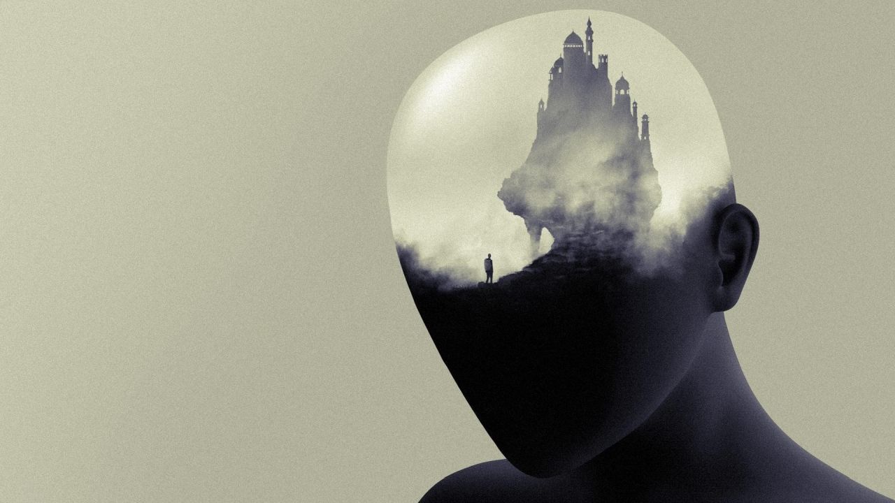 Castle inside a human head silhouette