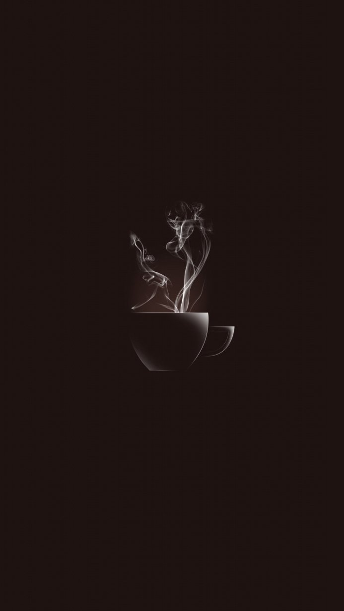 Steaming coffee in a white cup on a dark brown background
