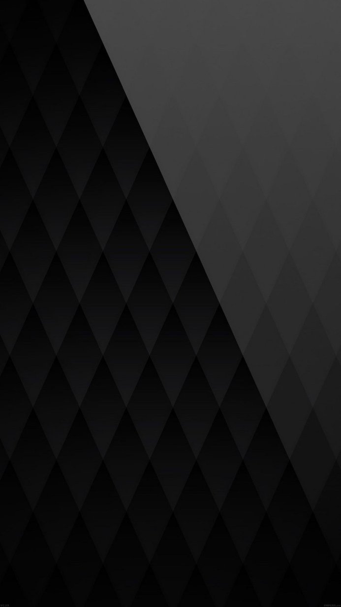 Dark rhombus pattern background with subtle variations in shade