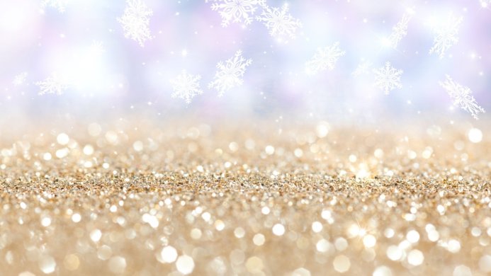 Gold glitter with white snowflakes, holiday background