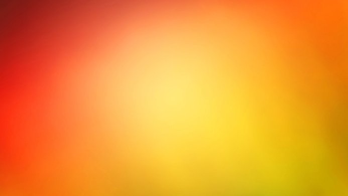 Abstract gradient background in shades of orange, yellow, and red