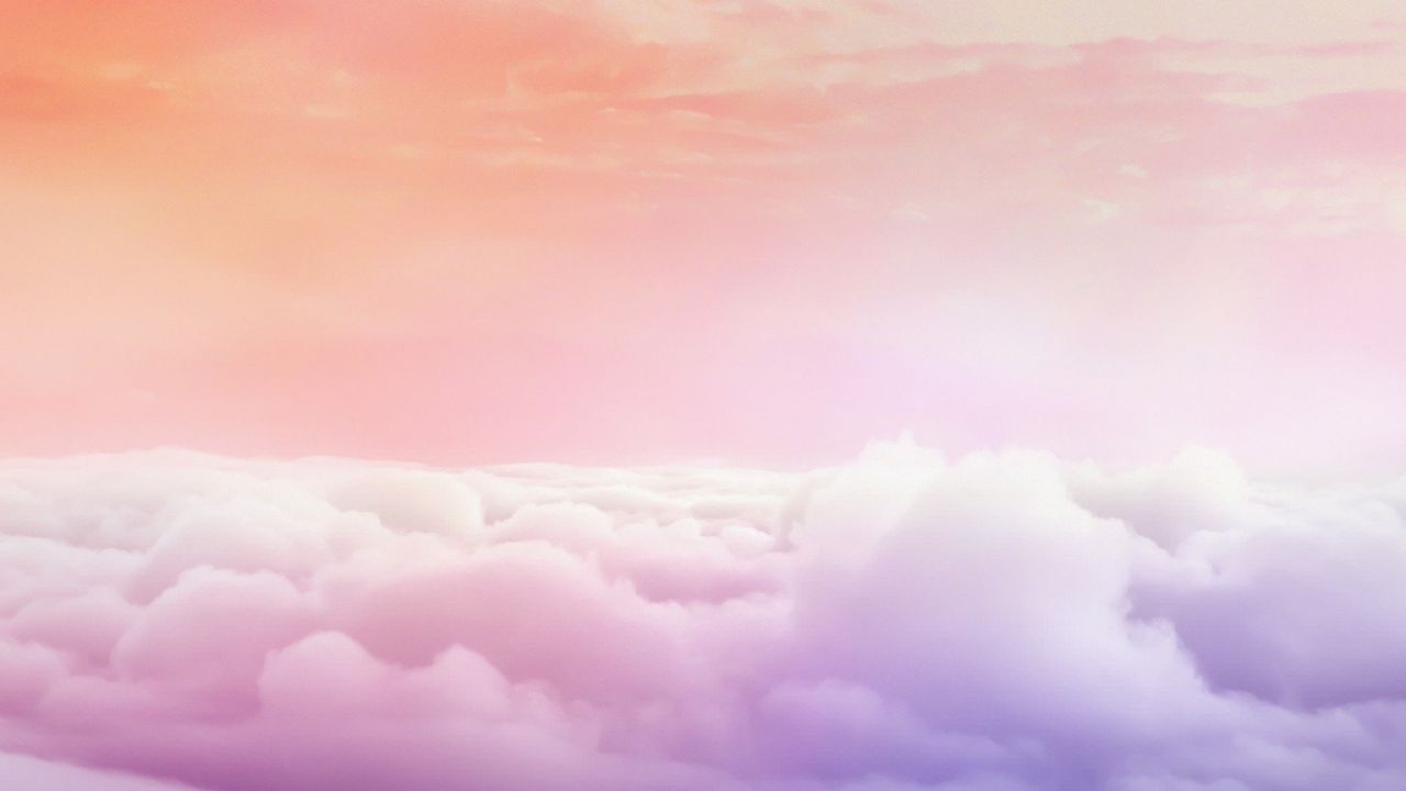 Pastel gradient sky with fluffy clouds