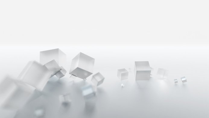 Scattered translucent cubes on a white surface, minimalist abstract background