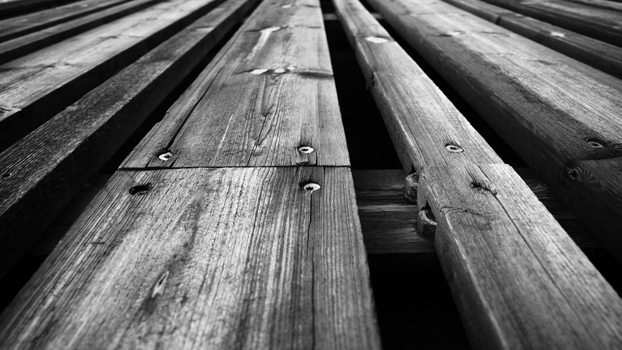 Monochrome wooden planks texture perspective