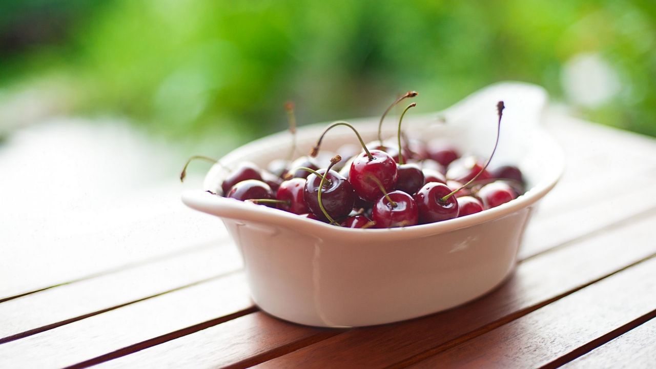 Bowl full of red cherries