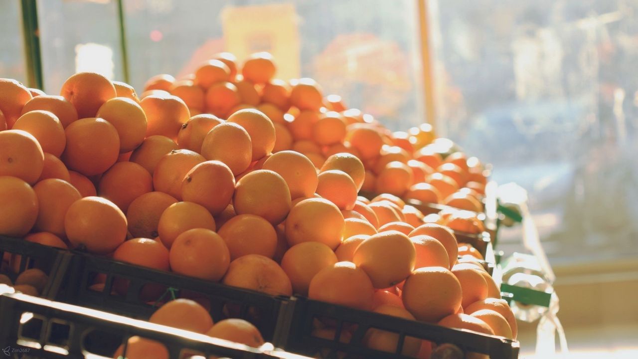 Pile of oranges in crates