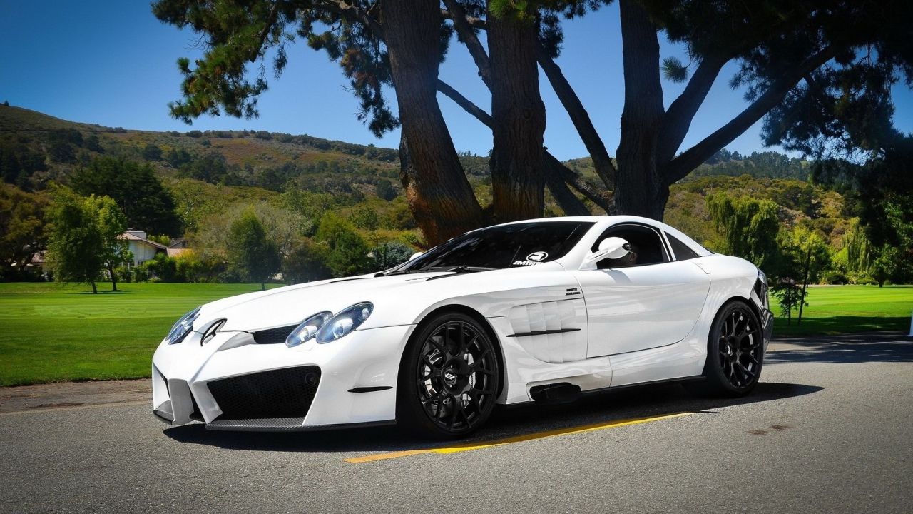 White Mercedes-Benz SLR McLaren parked outdoors