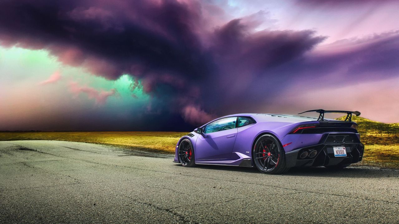 Purple Lamborghini Huracan on the road