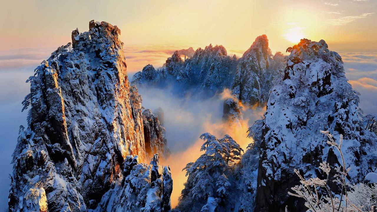 Snowy mountains at sunrise