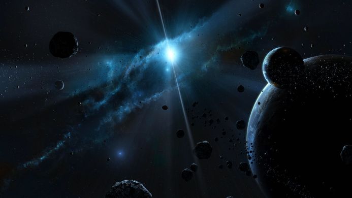 A bright light in the space with a planet and a lot of asteroids