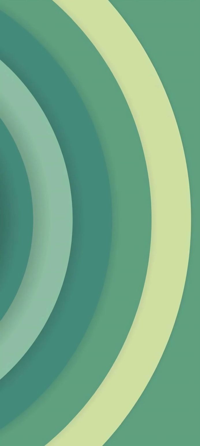 Abstract circles in shades of green and yellow create a sense of depth