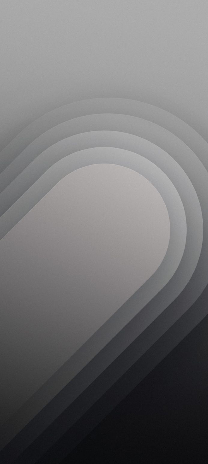 Abstract grey shapes forming a layered, minimal design