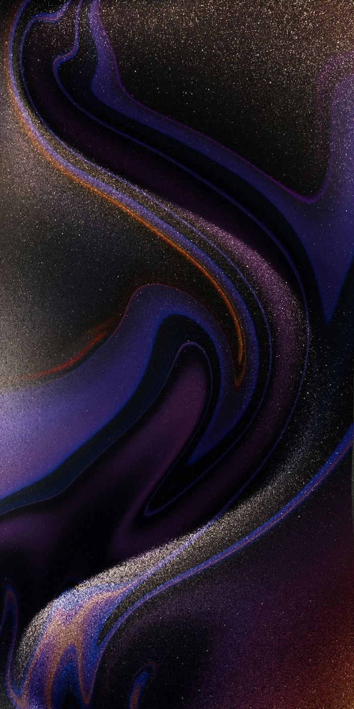 Abstract swirl of purple, blue, gold and black colors
