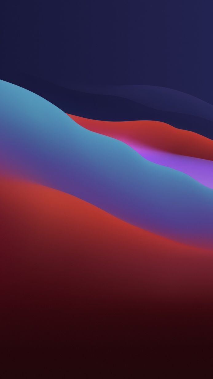 Abstract waves in shades of blue, red and purple creating a fluid colorful background