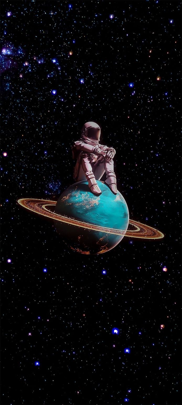 Astronaut sitting on a planet in space with stars and a ring around the planet