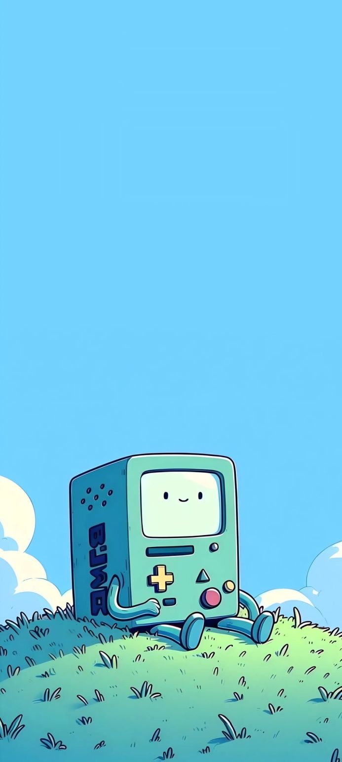 BMO from Adventure Time sitting in the grass against a blue sky with clouds