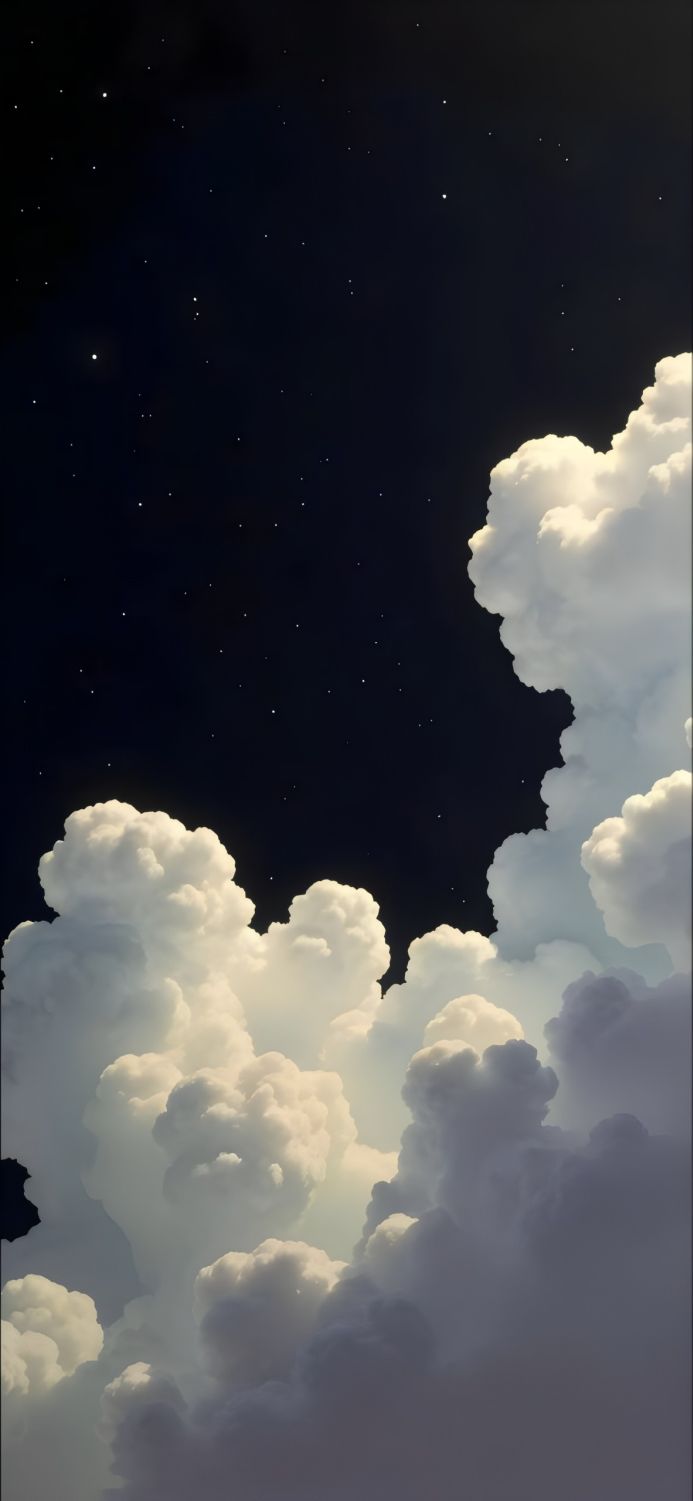 Fluffy white clouds against a dark blue starry sky