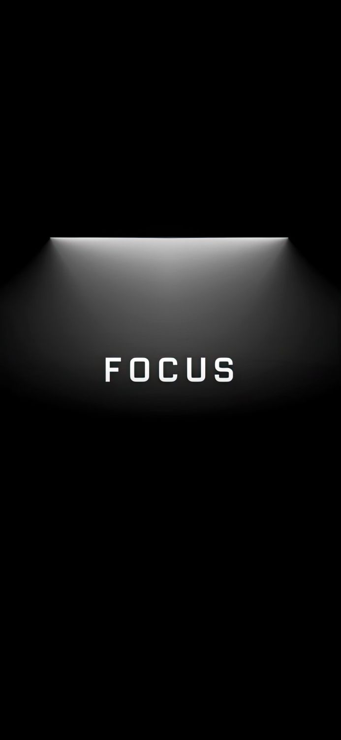 The word "FOCUS" is illuminated on a black background