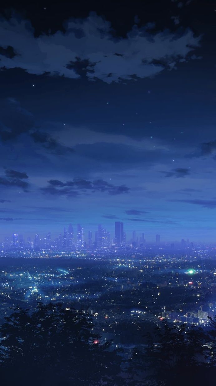 Night cityscape with city lights and dark blue sky