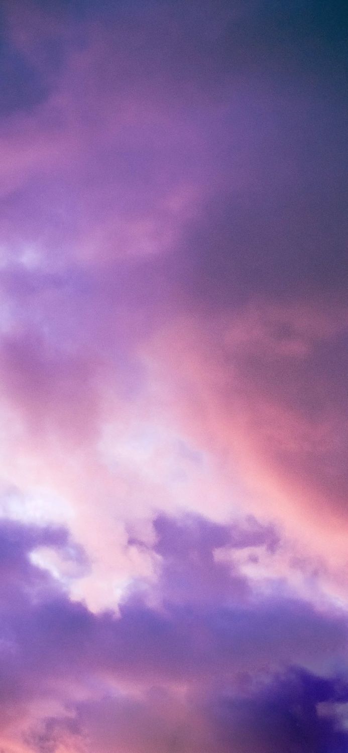 Purple and pink clouds at sunset