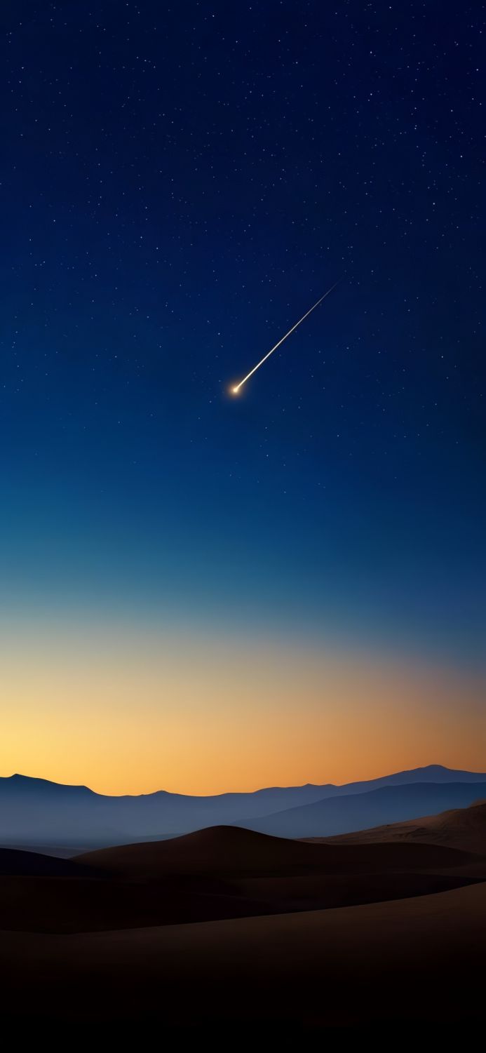 A shooting star over a desert landscape at night, with a gradient sky of blue and orange