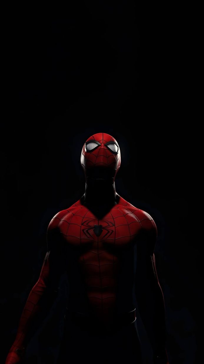 Spider-Man in a red and black suit stands in shadows, looking up