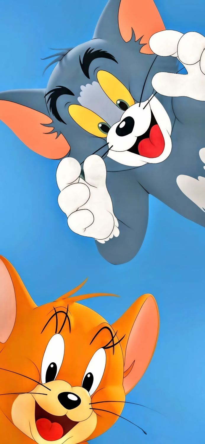 Tom and Jerry characters peeking into the frame against a blue backdrop