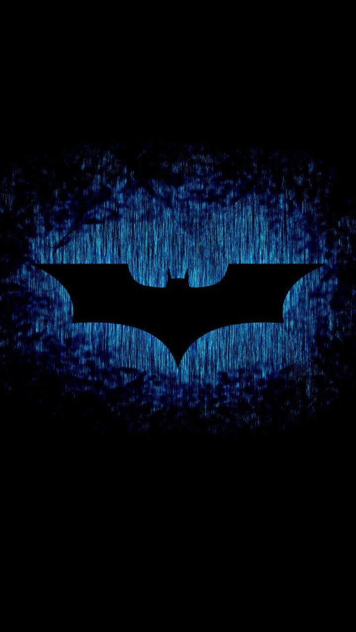 Batman logo silhouette blue texture background