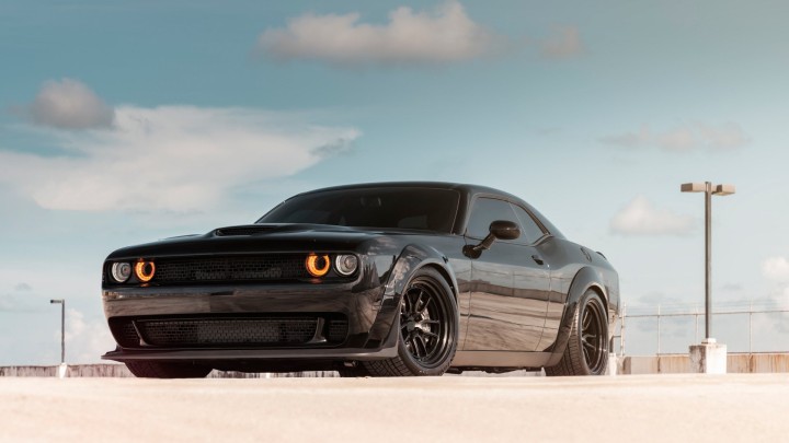 Black Dodge Challenger car parked outdoors