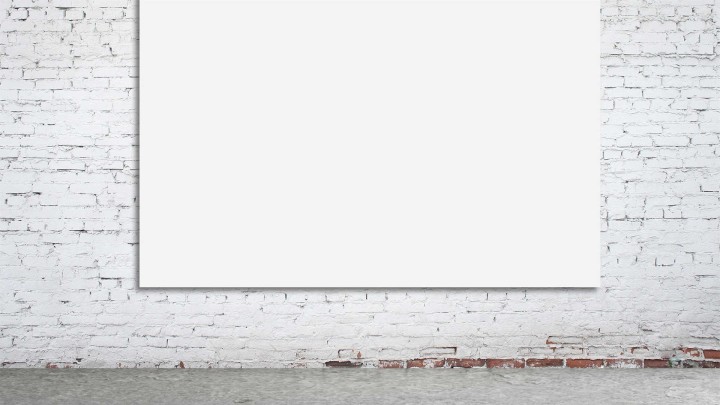 Blank white canvas on a white brick wall background