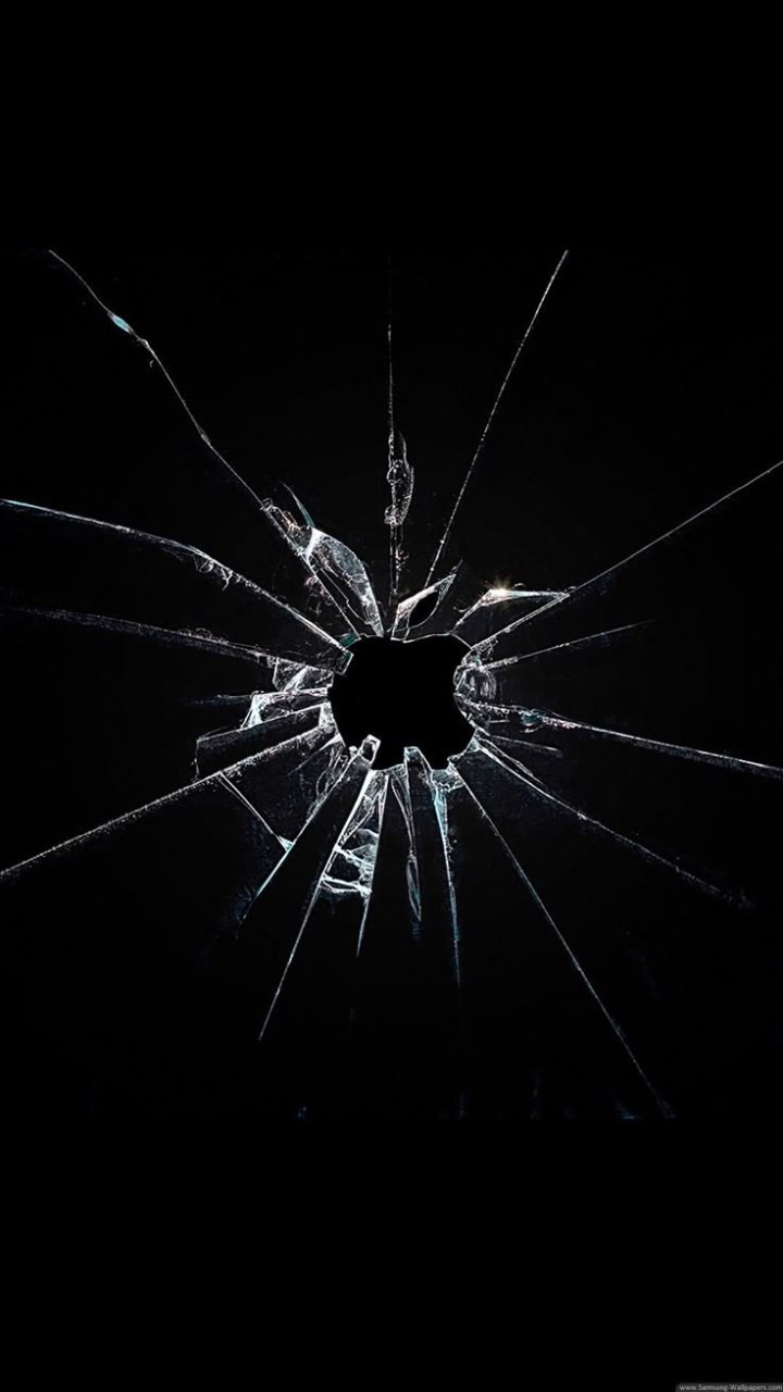 Broken glass screen with central hole and radiating cracks