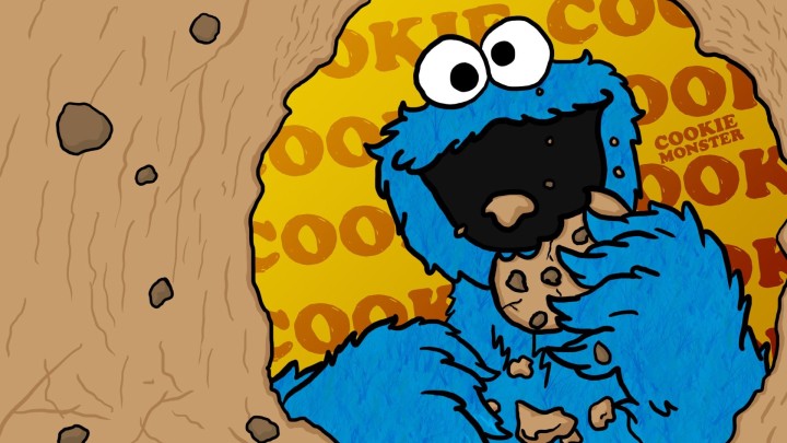 Cookie Monster eating a chocolate chip cookie