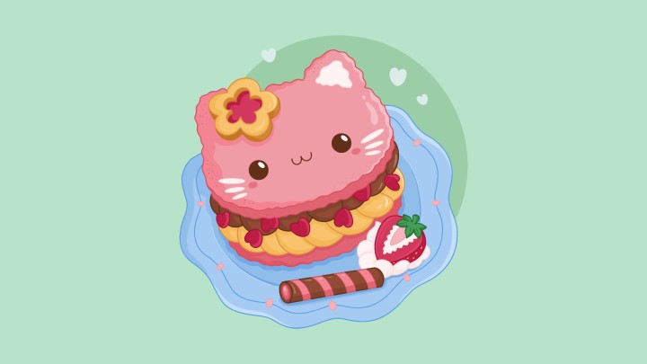 Cute cat shaped dessert on blue plate with strawberry