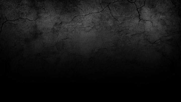 Dark grunge wall texture background with cracks