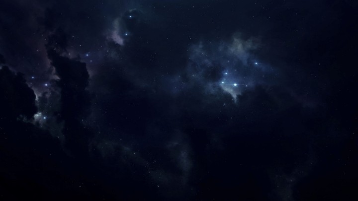 Dark night sky with stars and clouds