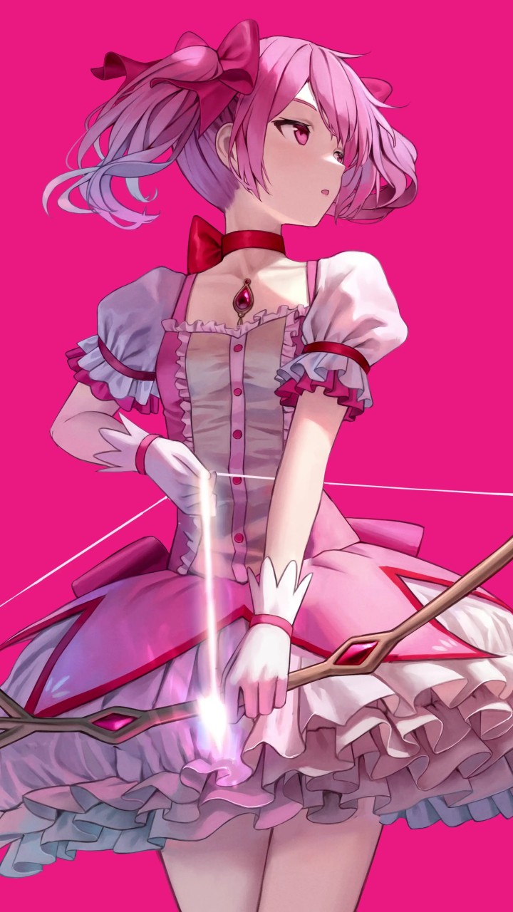 Madoka Kaname in pink dress holding light in hands