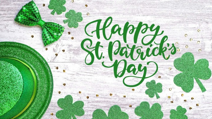 St Patricks Day text hat shamrocks on green