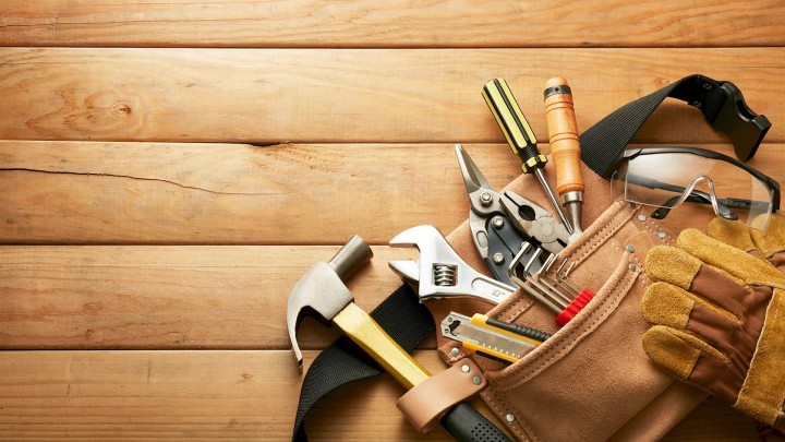 Tools in a toolbox on a dark background