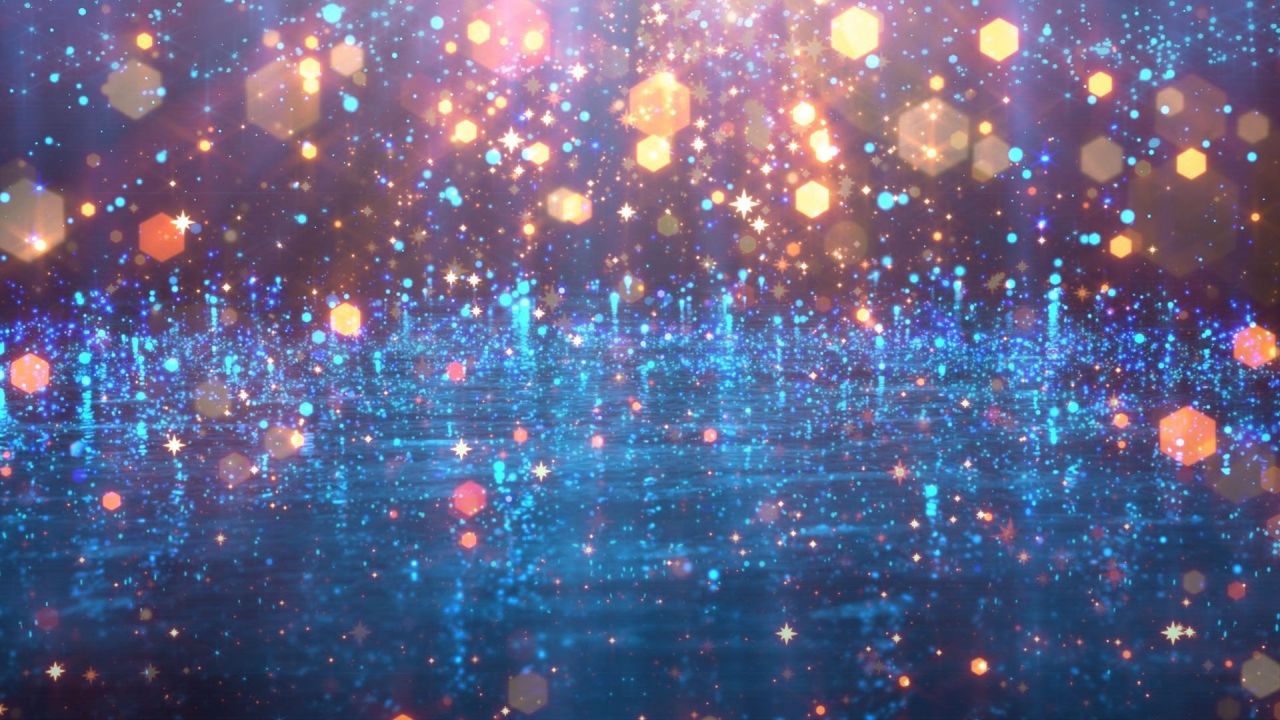 Abstract background blue orange bokeh light particles