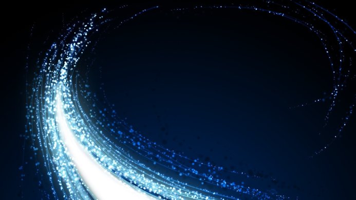 Abstract blue and white lights forming a dynamic wave pattern