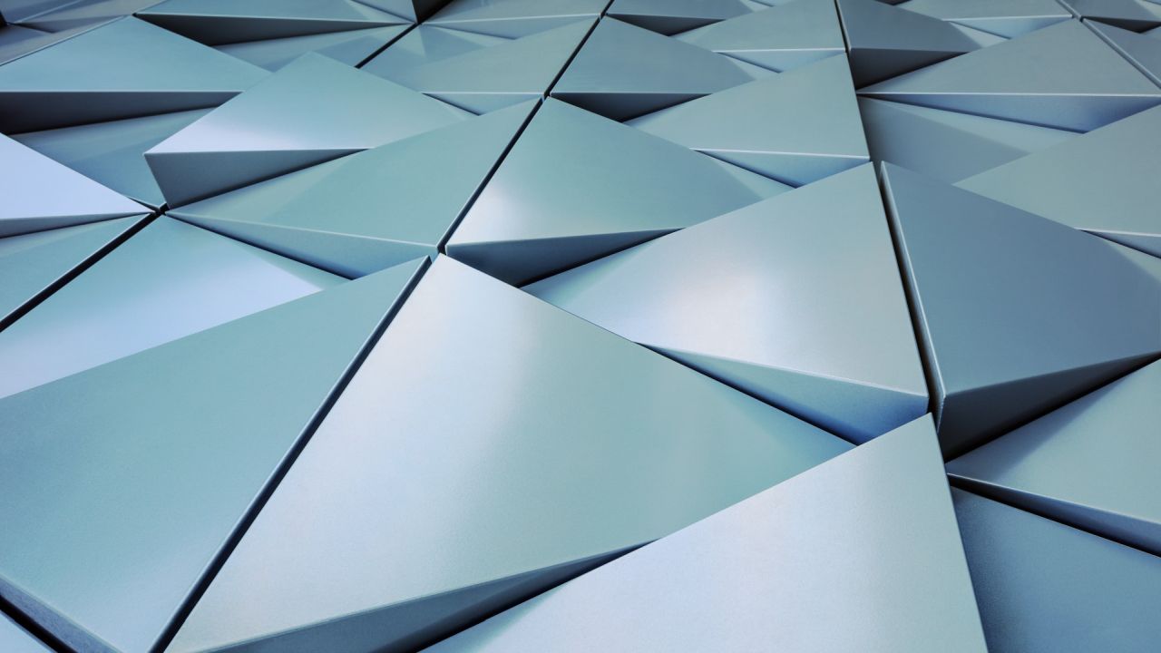 Abstract geometric pattern of grey blue triangles