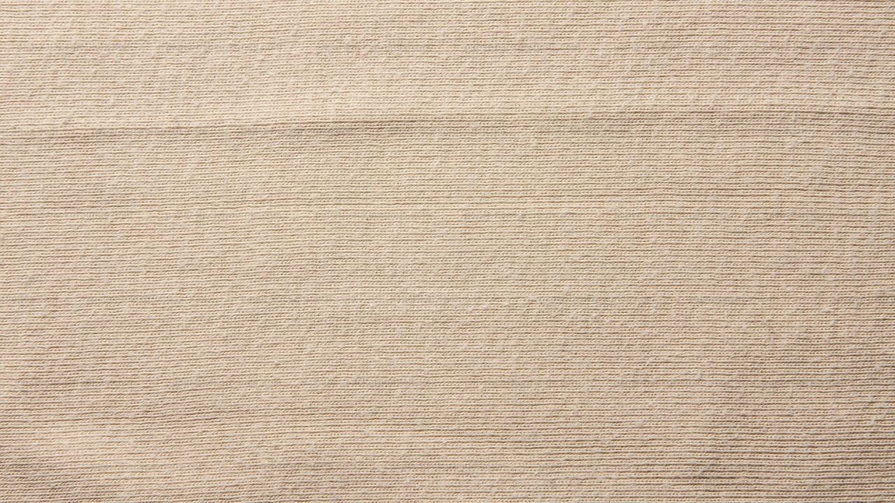 Light beige fabric texture with ribbed pattern