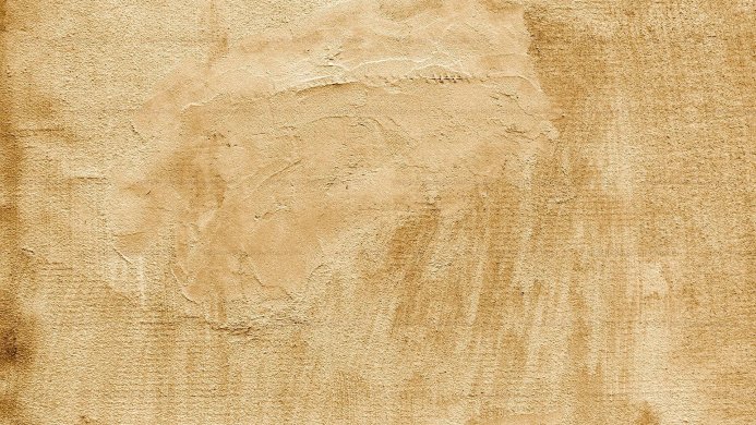 Beige wall texture with rough surface and brown undertones