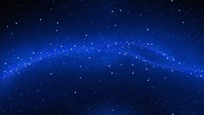 A blue galaxy filled with shining stars in the night sky
