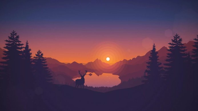 Silhouette of a deer in a mountain landscape with sunset over a lake
